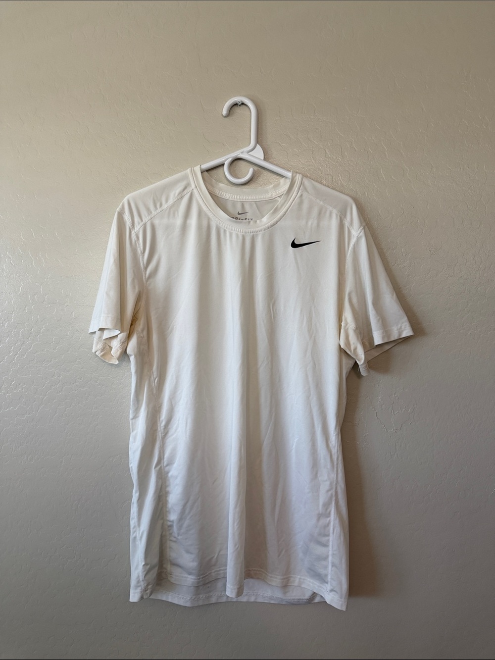 Nike White Short-Sleeve Performance Tee with Black Swoosh